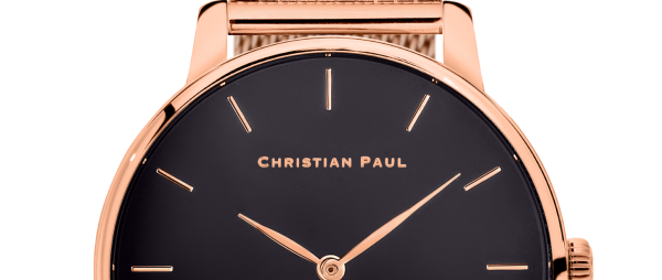 Luxury rose gold mesh and black dial watch